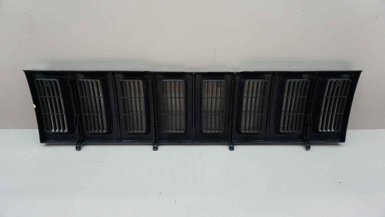 1993-1995 JEEP GRAND CHEROKEE ZJ FRONT UPPER CENTER RADIATOR GRILLE OEM 55054889