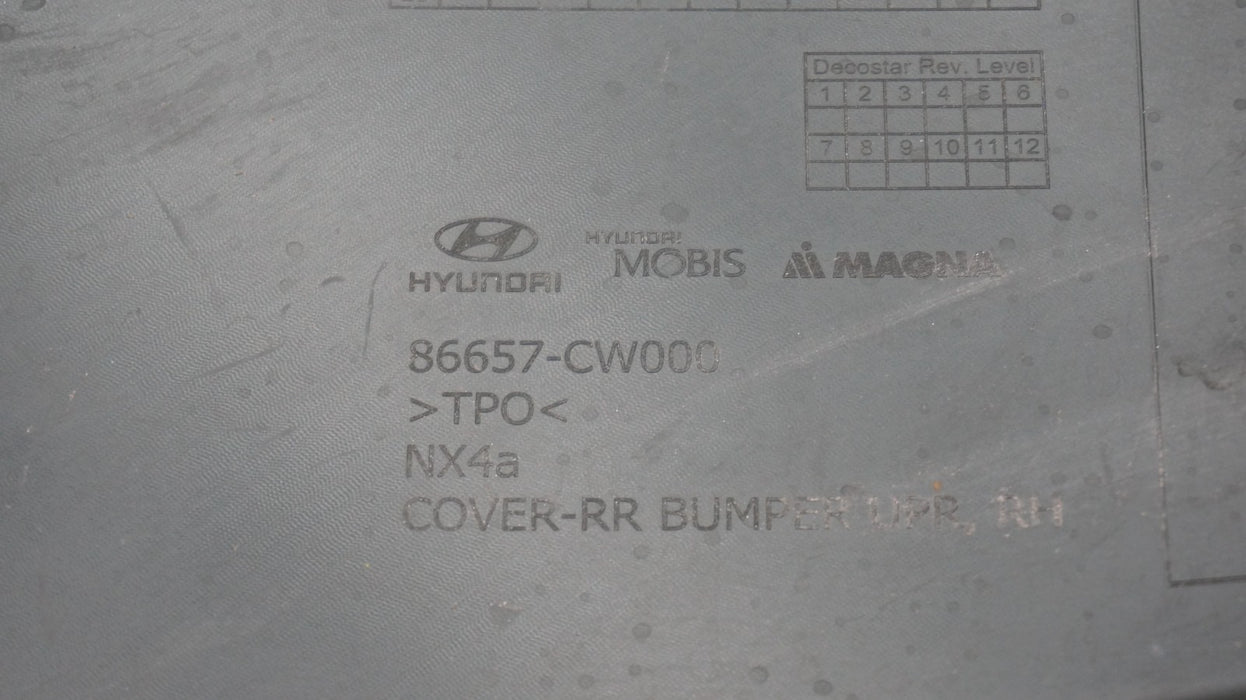 2022-2025 HYUNDAI TUCSON REAR RIGHT BUMPER CAP OEM 86657-CW000