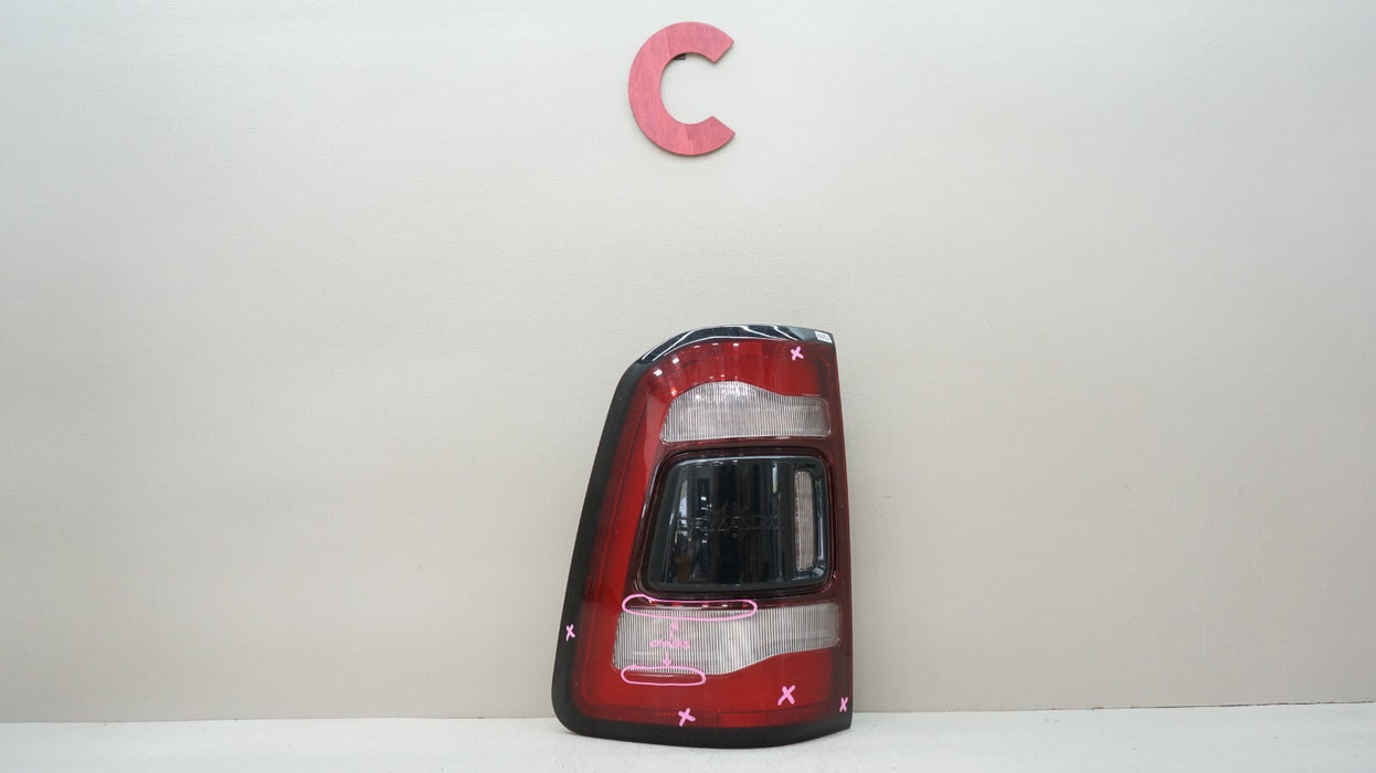 2019-2024 DODGE RAM 1500 REAR LEFT SIDE TAIL LIGHT OEM 55112993AD *CRACKED*
