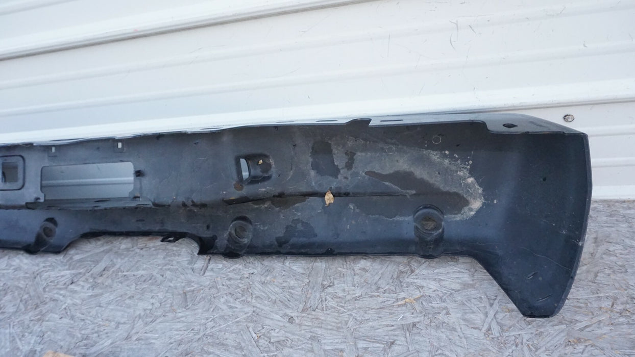 2002-2006 CADILLAC ESCALADE REAR BUMPER COVER PANEL PLASTIC 15063812 OEM