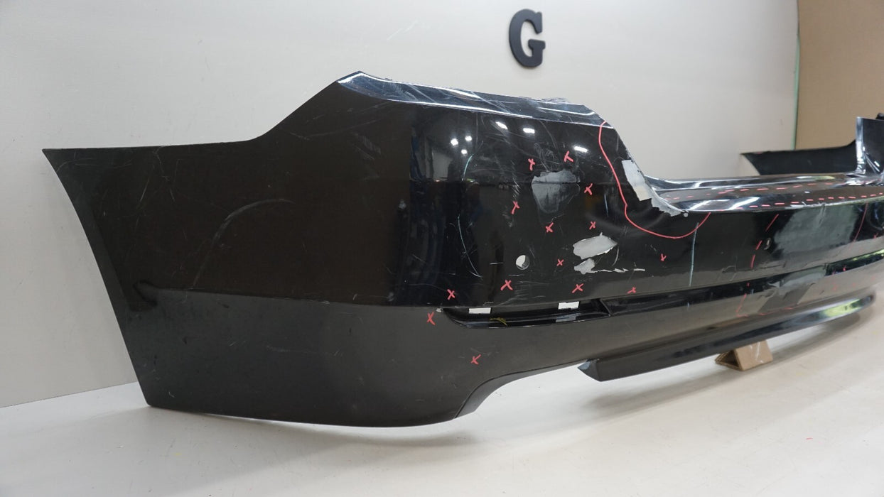 2011-2013 BMW 528I F10 SEDAN REAR BUMPER COVER PANEL W/ SENSOR HOLE OEM 7240372
