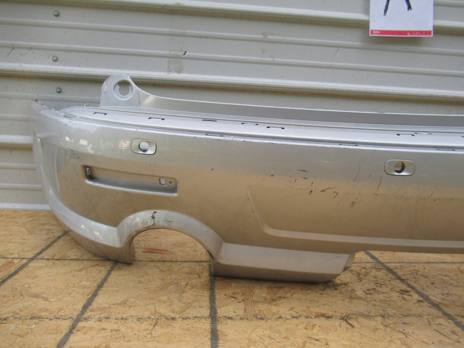 2011-2012 GMC ACADIA DENALI REAR PLASTIC BUMPER SHELL COVER FACTORY OEM
