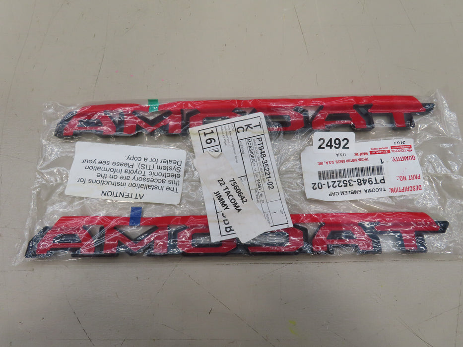 2016-2023 TOYOTA TACOMA GENUINE BLACKOUT EMBLEM NAMEPLATE OEM PT948-35221-02