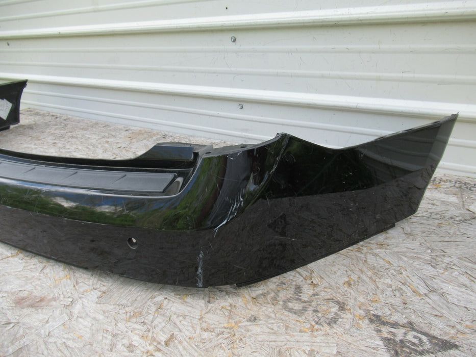 2010-2016 CADILLAC SRX REAR BUMPER COVER PANEL BLACK PLASTIC 20835695 OEM