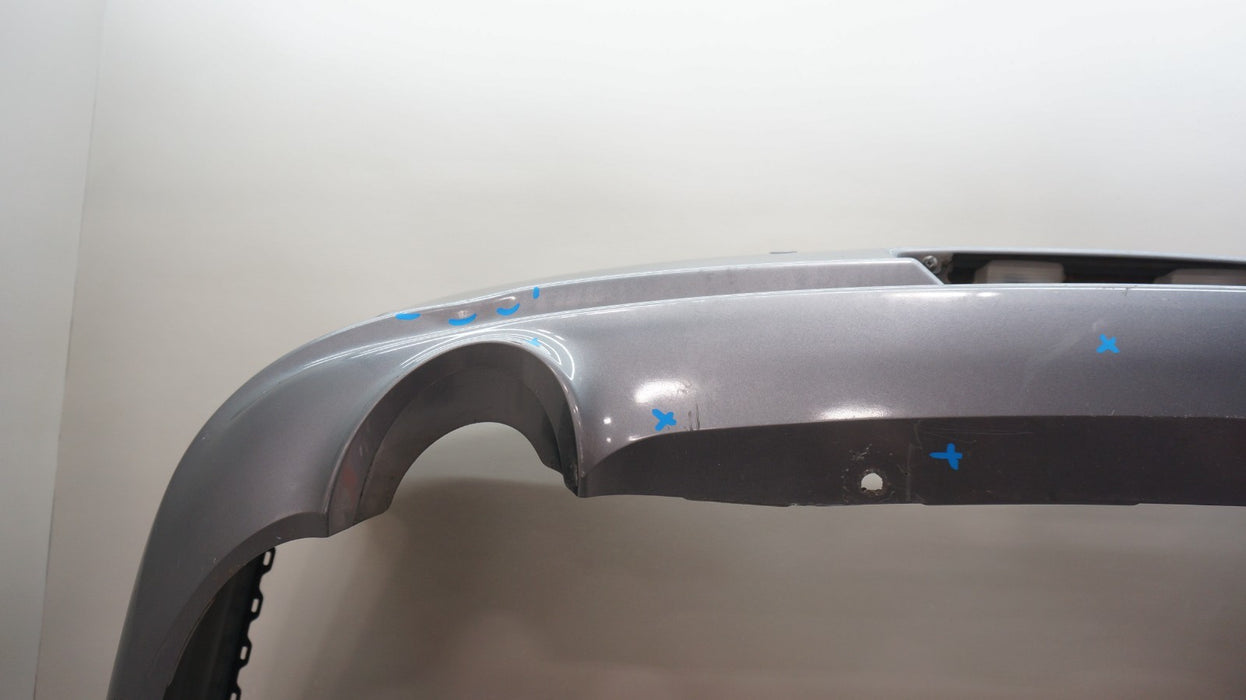 2009-2013 INFINITI G37 SEDAN REAR BUMPER COVER PANEL OEM