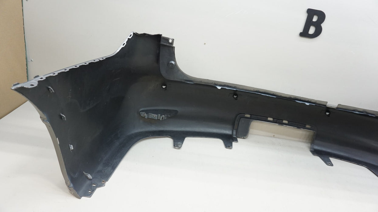 2011-2013 INFINITI QX56 REAR BUMPER COVER PANEL W/ SENSOR HOLE OEM 85022-1LA0H