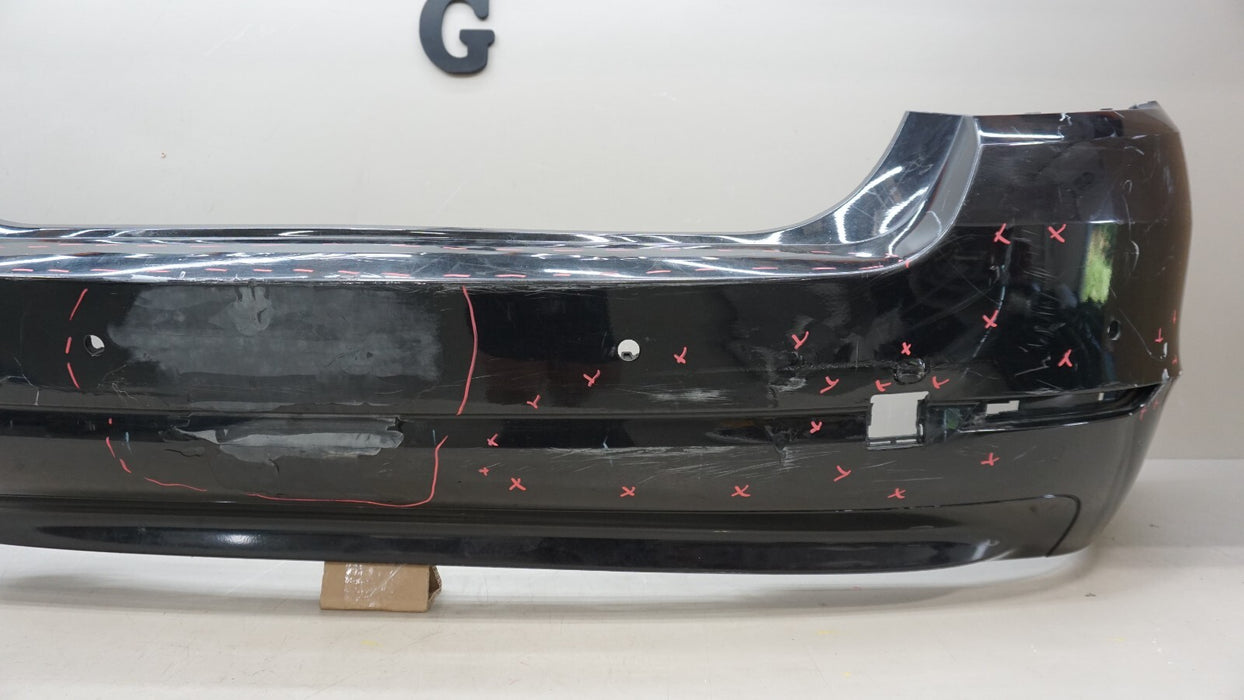 2011-2013 BMW 528I F10 SEDAN REAR BUMPER COVER PANEL W/ SENSOR HOLE OEM 7240372