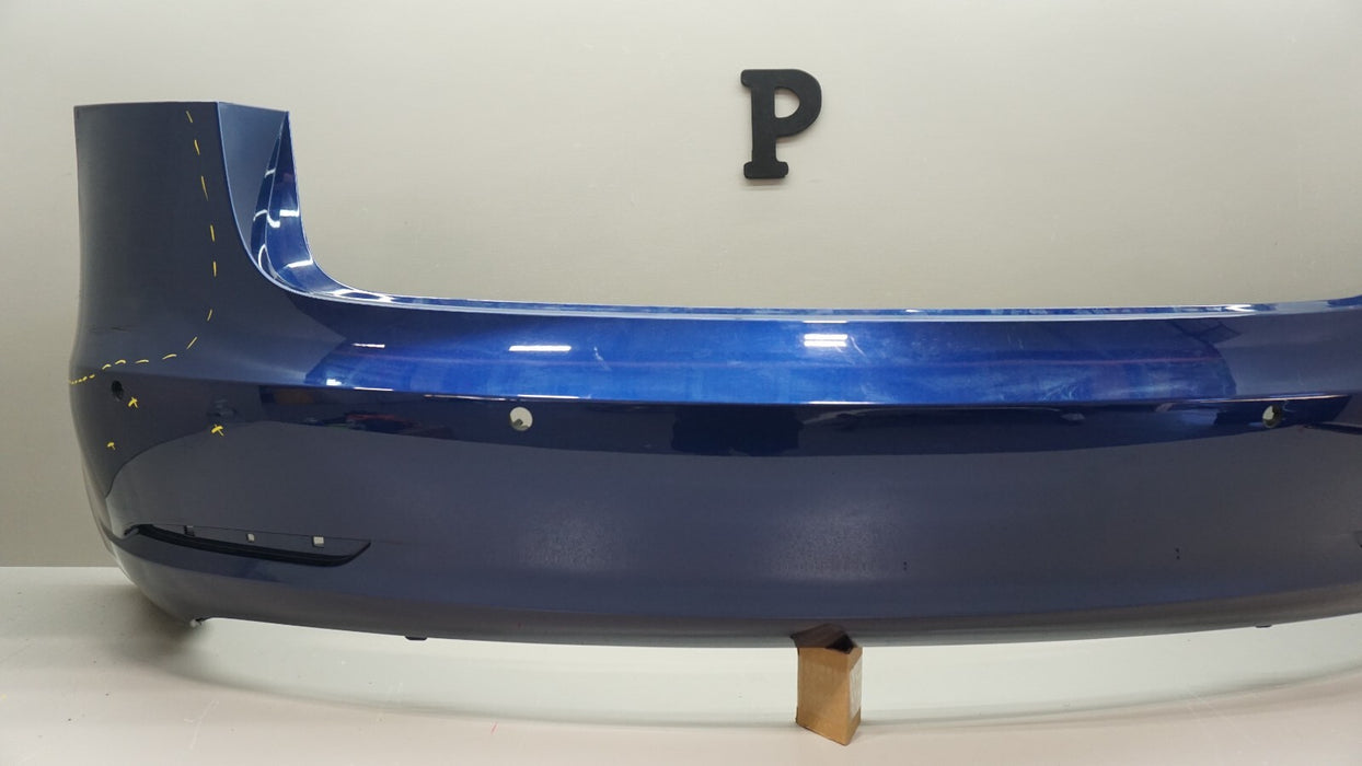 2017-2023 TESLA MODEL 3 REAR BUMPER COVER W/ SENSOR HOLES OEM