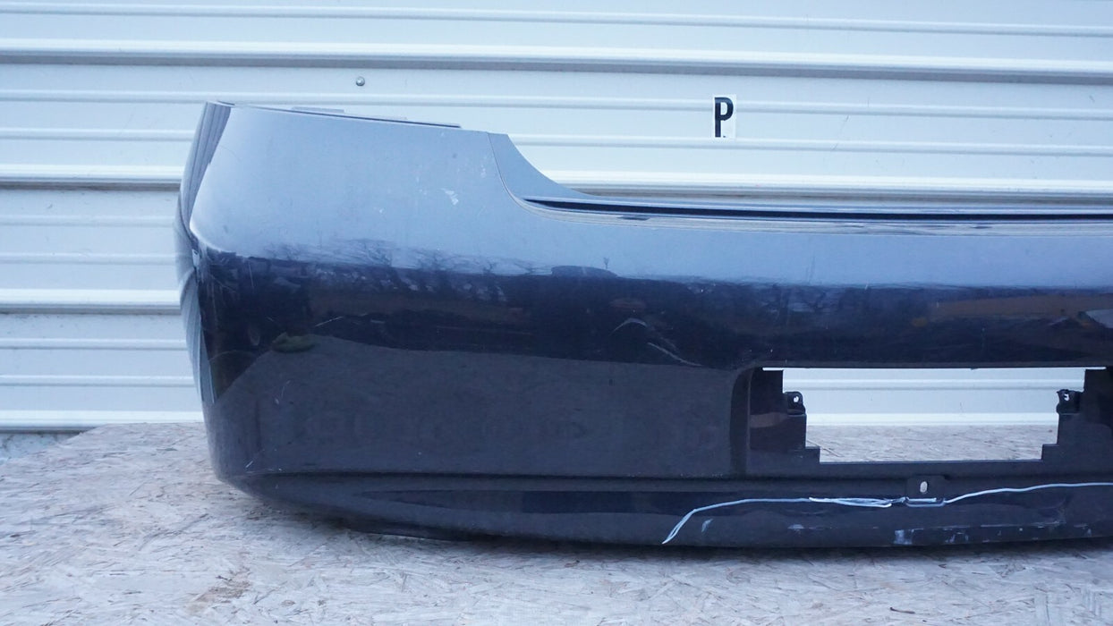 2010-2013 INFINITI G37 REAR BUMPER COVER PANEL PLASTIC 850221NF0H OEM 12 13