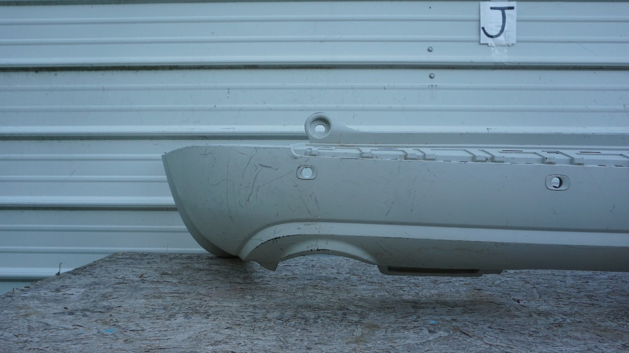 2008-2012 BUICK ENCLAVE REAR BUMPER COVER PANEL PLASTIC FACTORY OEM