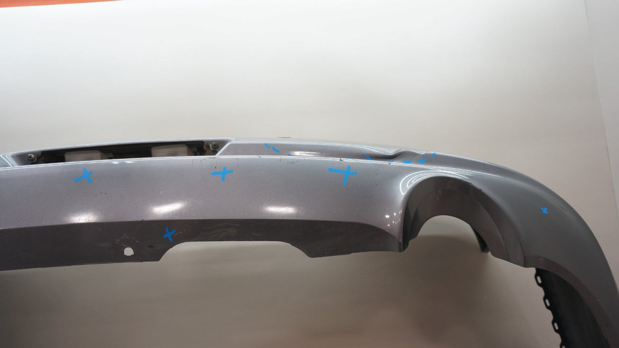 2009-2013 INFINITI G37 SEDAN REAR BUMPER COVER PANEL OEM