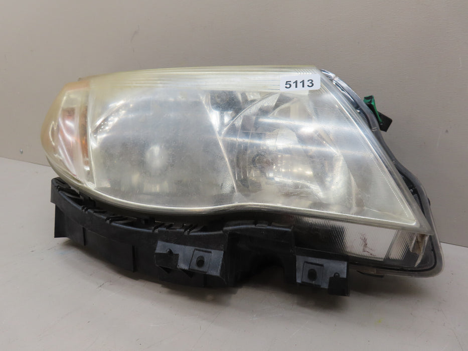 2009-2012 SUBARU FORESTER FRONT RIGHT PASSENGER SIDE HEADLIGHT OEM