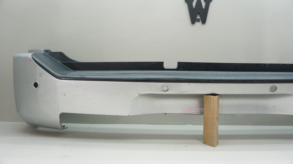 2004-2010 INFINITI QX56 REAR BUMPER COVER PANEL OEM 85022-7S600