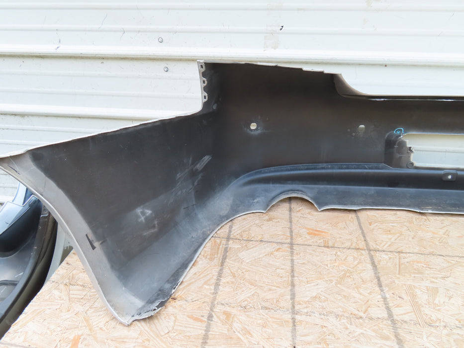 2010-2013 INFINITI G25 G35 Q40 REAR BUMPER COVER OEM