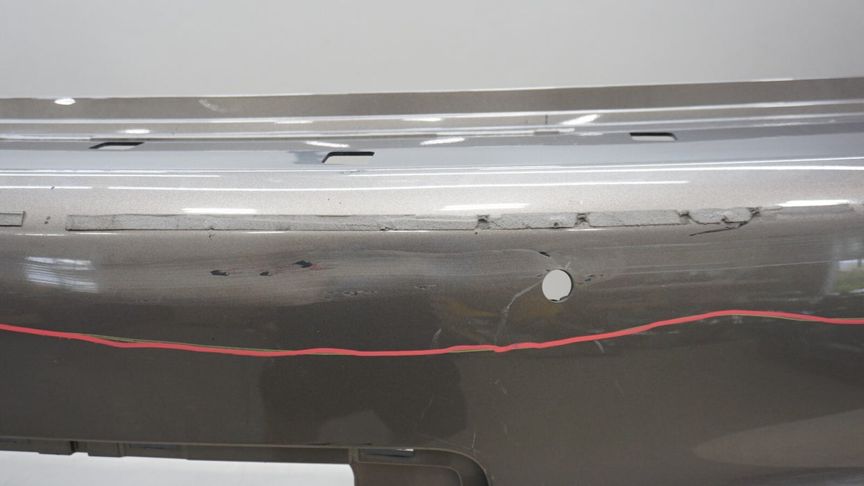 2011-2013 INFINITI QX56 REAR BUMPER COVER PANEL W/ SENSOR HOLE OEM 85022-1LA0H