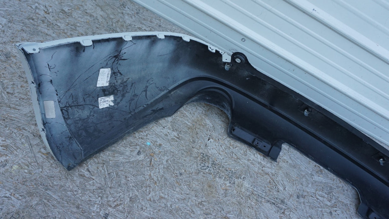 2008-2012 BUICK ENCLAVE REAR BUMPER COVER PANEL PLASTIC FACTORY OEM