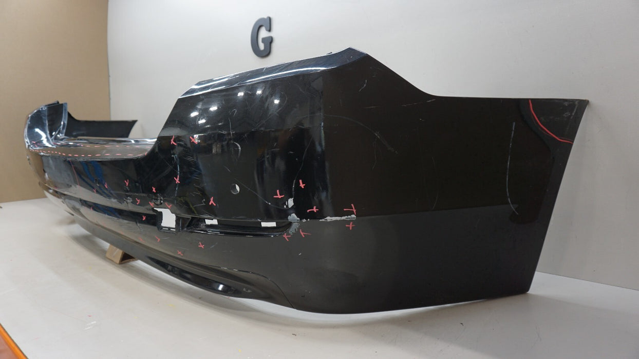 2011-2013 BMW 528I F10 SEDAN REAR BUMPER COVER PANEL W/ SENSOR HOLE OEM 7240372