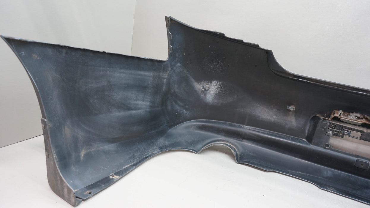2009-2013 INFINITI G37 SEDAN REAR BUMPER COVER PANEL OEM