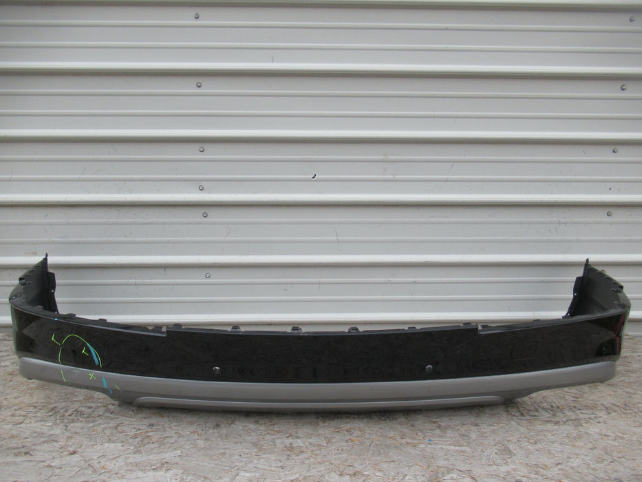 2017-2019 AUDI Q7 REAR BUMPER COVER VALANCE  /W PARKING SENSOR HOLES OEM