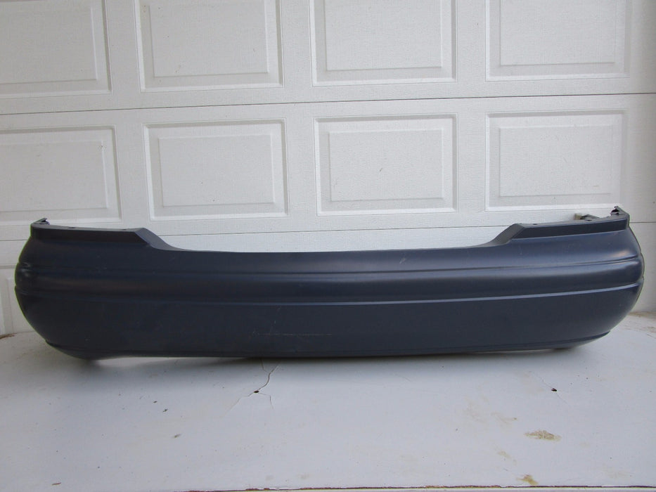 01 02 03 04 FORD FOCUS SEDAN REAR BUMPER COVER OEM