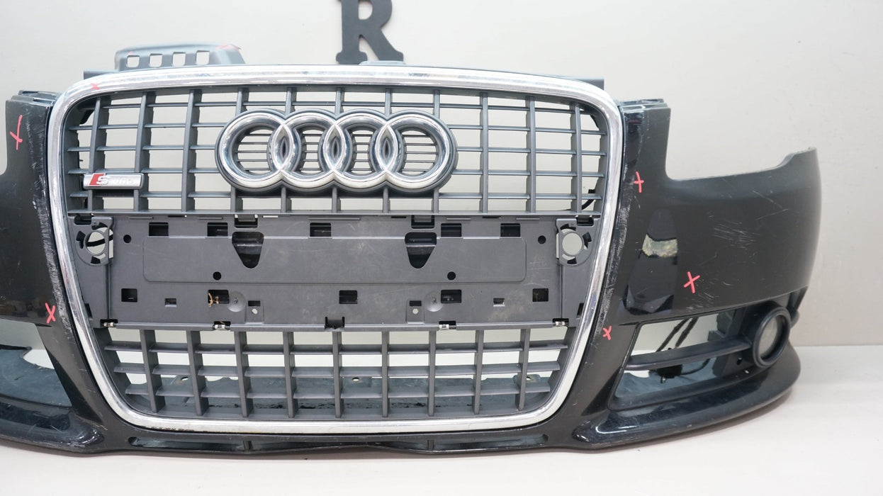 2005-2008 AUDI A4 S-LINE FRONT BUMPER COVER WITH GRILLE AND FOG LIGHTS OEM
