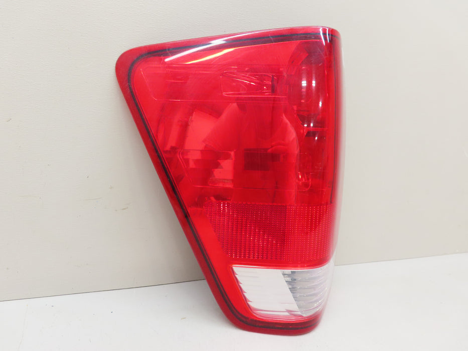 2004-2015 NISSAN TITAN REAR LEFT DRIVER SIDE TAIL LIGHT LAMP OEM 265557S216
