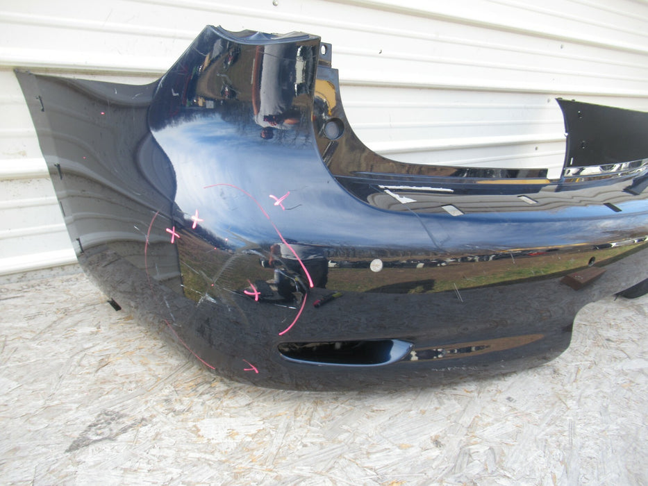 2011-2013 INFINITY QX56 REAR BUMPER COVER PANEL ASSEMBLY W/O STEP PLATE OEM