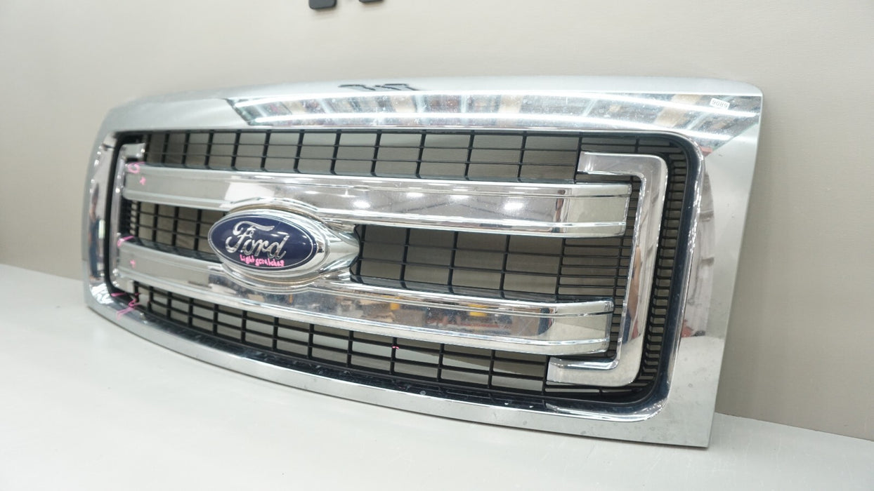 2013-2014 FORD F-150 RADIATOR GRILL GRILLE MOLDING CHROME W/ EMBLEM DL348200 OEM