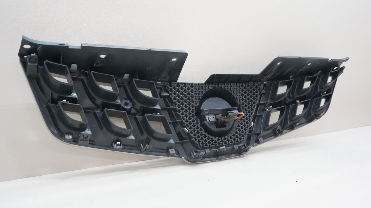 2011-2015 NISSAN ROGUE FRONT BUMPER GRILLE WITH CAMERA AND EMBLEM OEM 623101VX0A