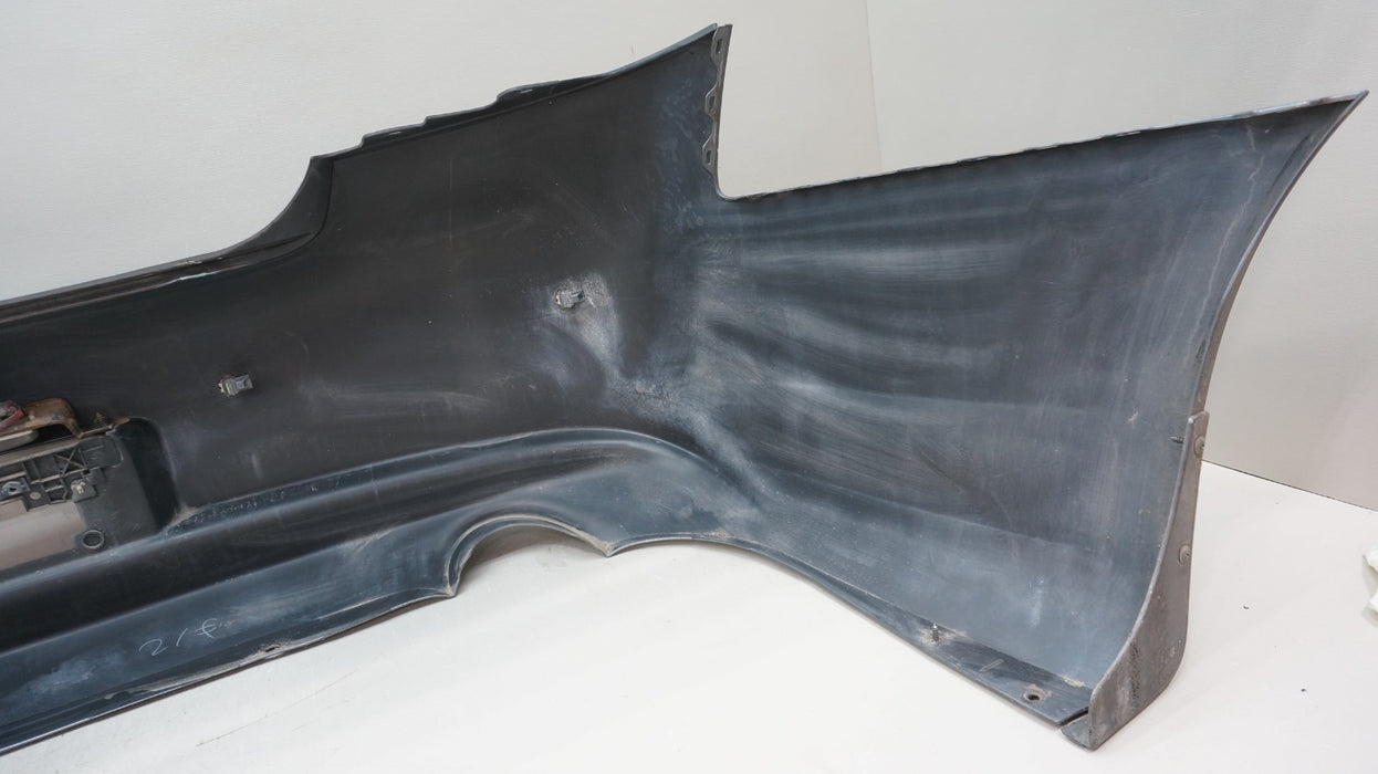 2009-2013 INFINITI G37 SEDAN REAR BUMPER COVER PANEL OEM