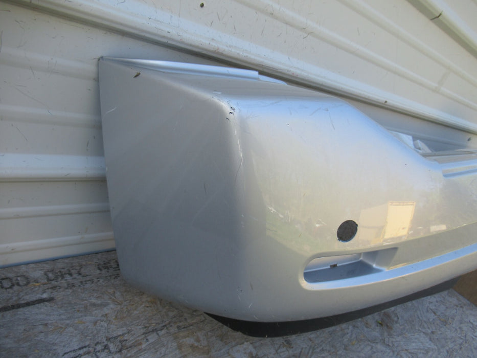 2008-2015 NISSAN ARMADA REAR BUMPER COVER PANEL PANEL 85022-ZQ00A OEM