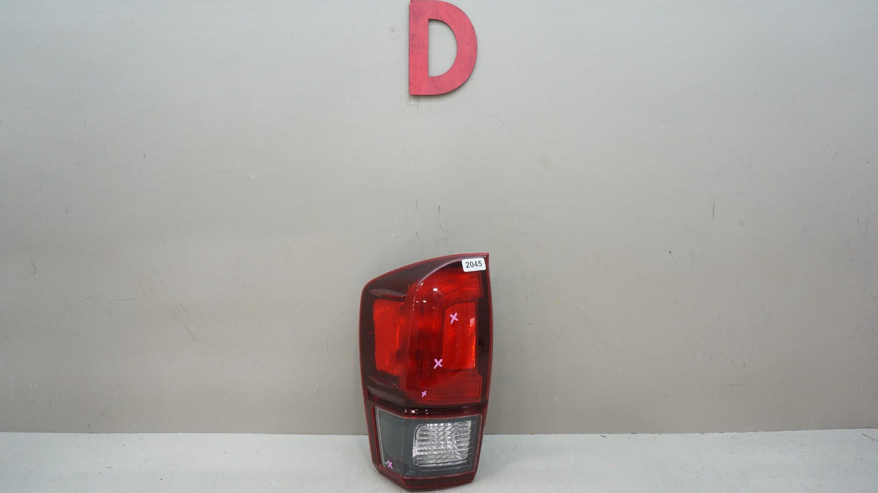 2016-2023 TOYOTA TACOMA REAR LEFT DRIVERS SIDE TAIL LIGHT OEM