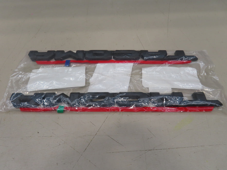 2016-2023 TOYOTA TACOMA GENUINE BLACKOUT EMBLEM NAMEPLATE OEM PT948-35221-02