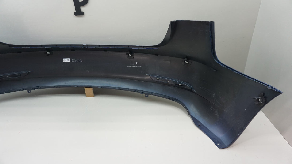 2017-2023 TESLA MODEL 3 REAR BUMPER COVER W/ SENSOR HOLES OEM