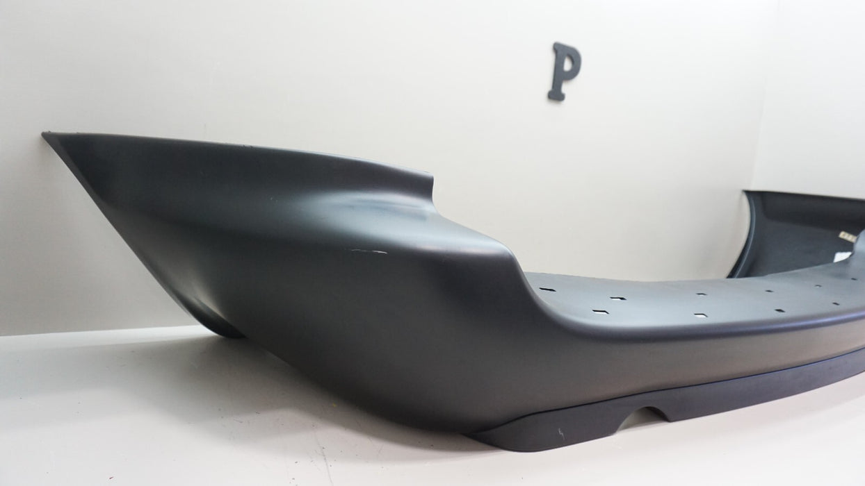 2001-2007 DODGE CARAVAN REAR BUMPER COVER AFTER MARKET 04857996AA