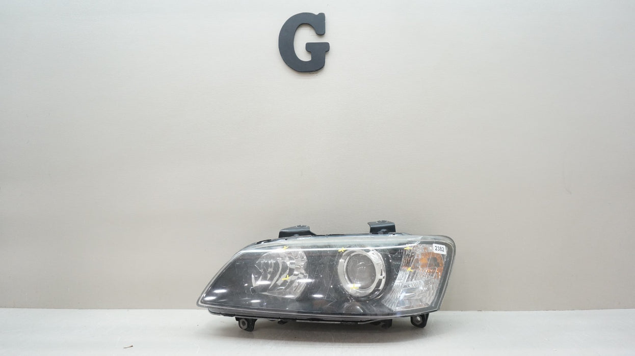 2008-2009 PONTIAC G8 FRONT LEFT DRIVER SIDE HALOGEN HEADLIGHT OEM
