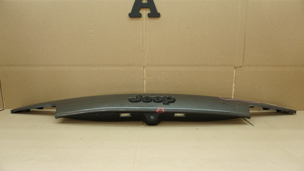 2014-2021 JEEP GRAND CHEROKEE LIFTGATE LICENSE LIGHT MOLDING OEM 1WD55TRMAD