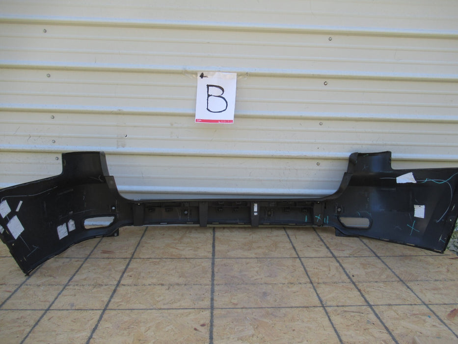 2011-2020 JEEP GRAND CHEROKEE REAR BUMPER COVER PANEL PLASTIC 57010724AD OEM
