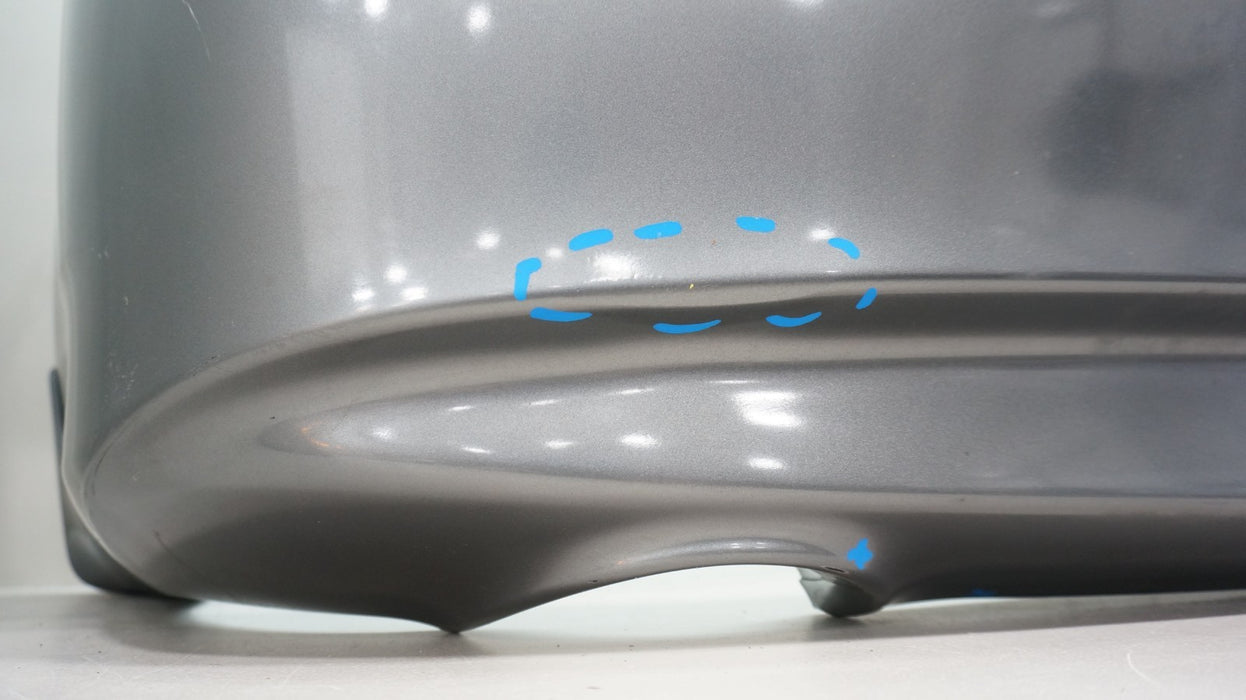 2009-2013 INFINITI G37 SEDAN REAR BUMPER COVER PANEL OEM