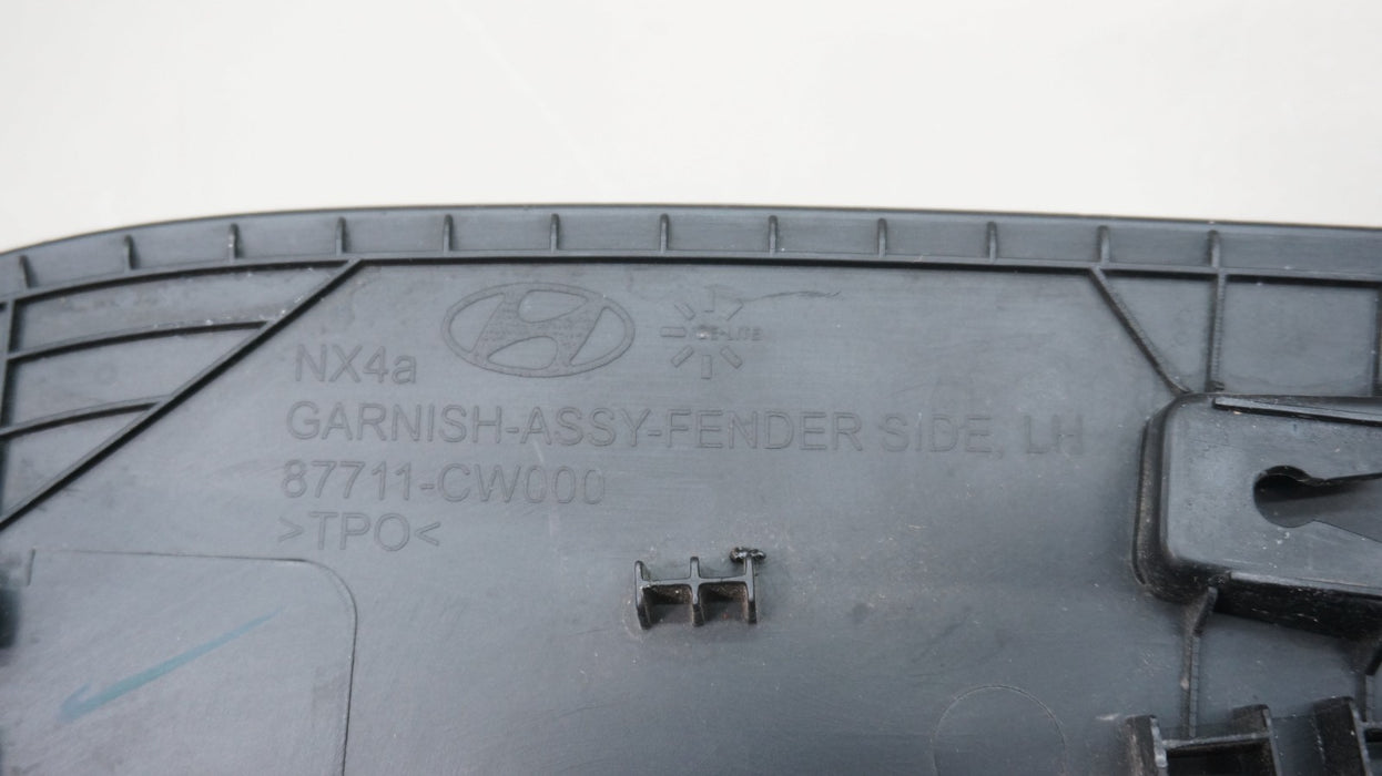 2022-2024 HYUNDAI TUCSON FRONT LEFT FENDER FLARE WHEEL ARCH OEM 87711-CW000