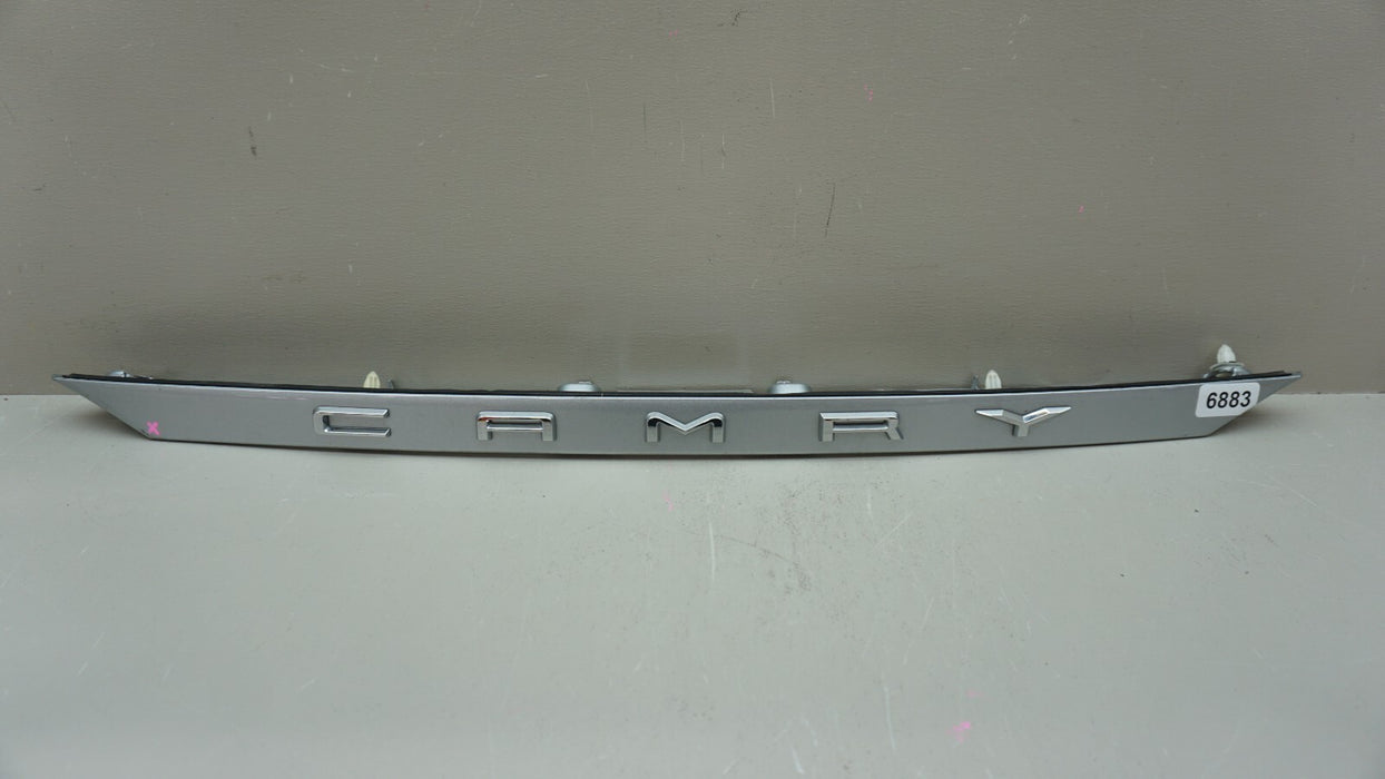 2018-2023 TOYOTA CAMRY REAR TAILGATE BADGE TRIM 76811-06B70 OEM