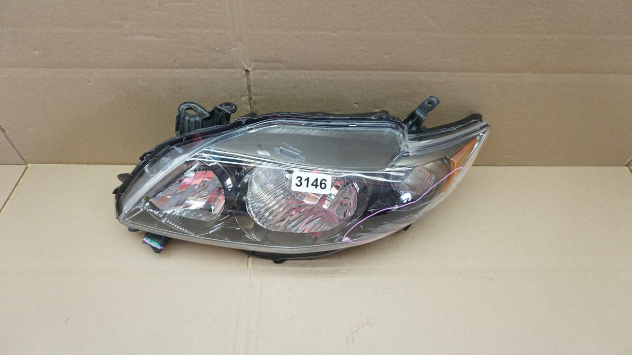 2009-2010 TOYOTA COROLLA FRONT LEFT DRIVER SIDE HEADLIGHT HALOGEN LAMP LIGHT OEM