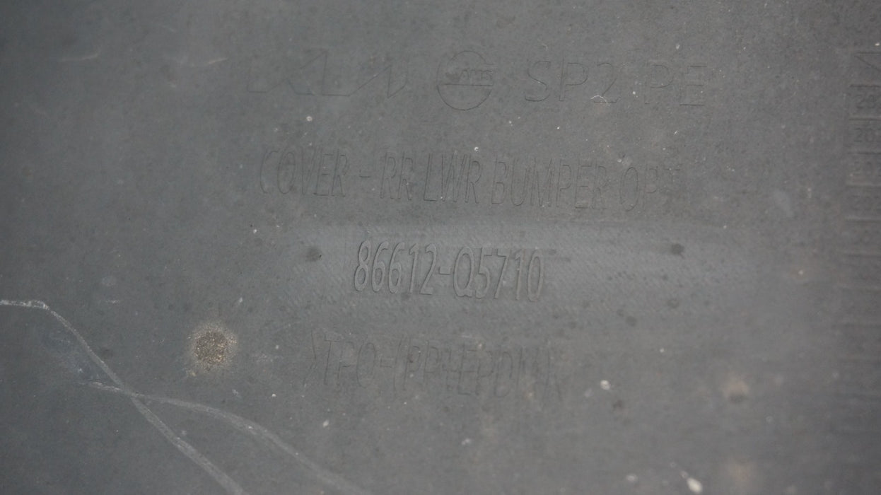 2024-2025 KIA SELTOS REAR BUMPER COVER PANEL 86612-Q5710 OEM