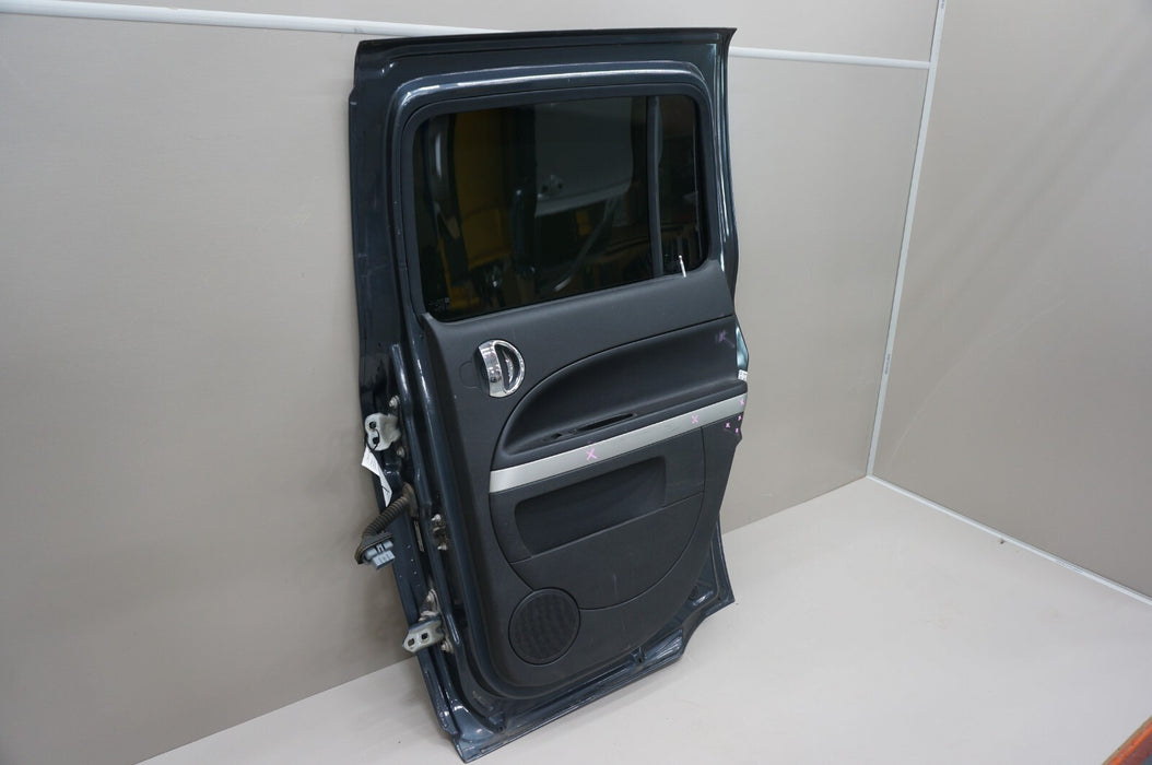 2006-2011 CHEVROLET HHR REAR RIGHT PASSENGER SIDE DOOR PANEL OEM W/ TRIM