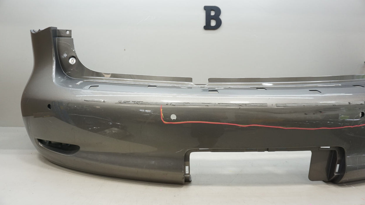 2011-2013 INFINITI QX56 REAR BUMPER COVER PANEL W/ SENSOR HOLE OEM 85022-1LA0H