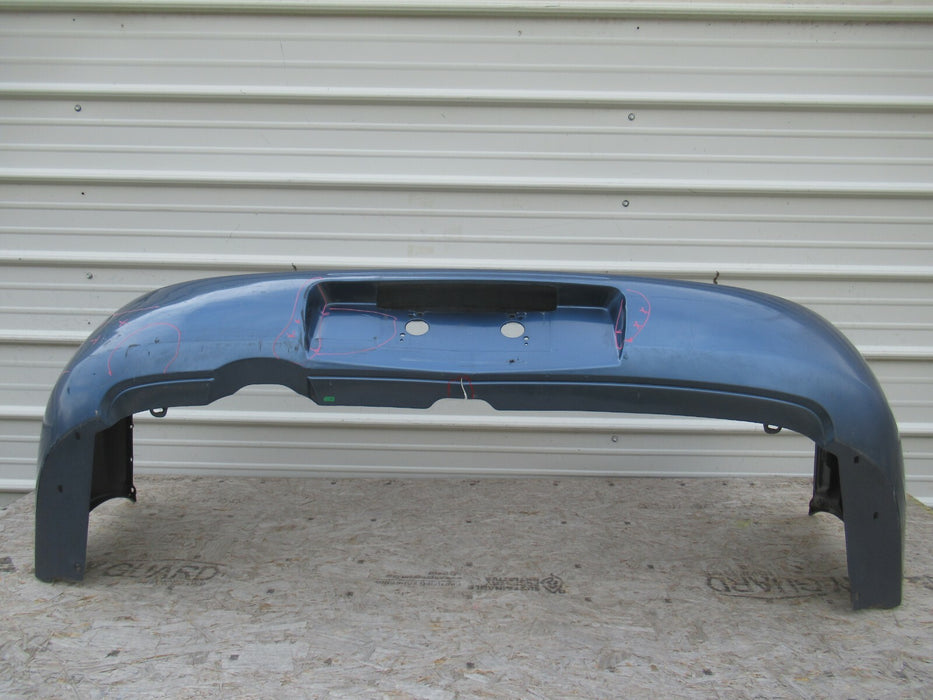 2005 - 2007 SUBARU WRX STI REAR BUMPER COVER PANEL FACTORY 57704FE160 OEM
