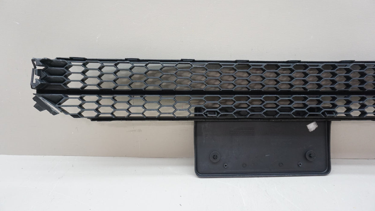 2012-2015 VOLKSWAGEN PASSAT FRONT LOWER GRILLE W/ PLATE HOLDER 561 853 677 OEM