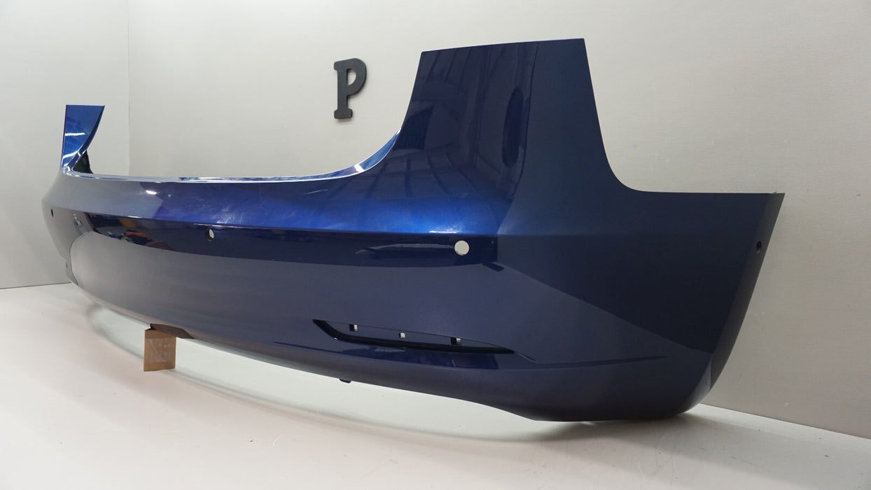 2017-2023 TESLA MODEL 3 REAR BUMPER COVER W/ SENSOR HOLES OEM