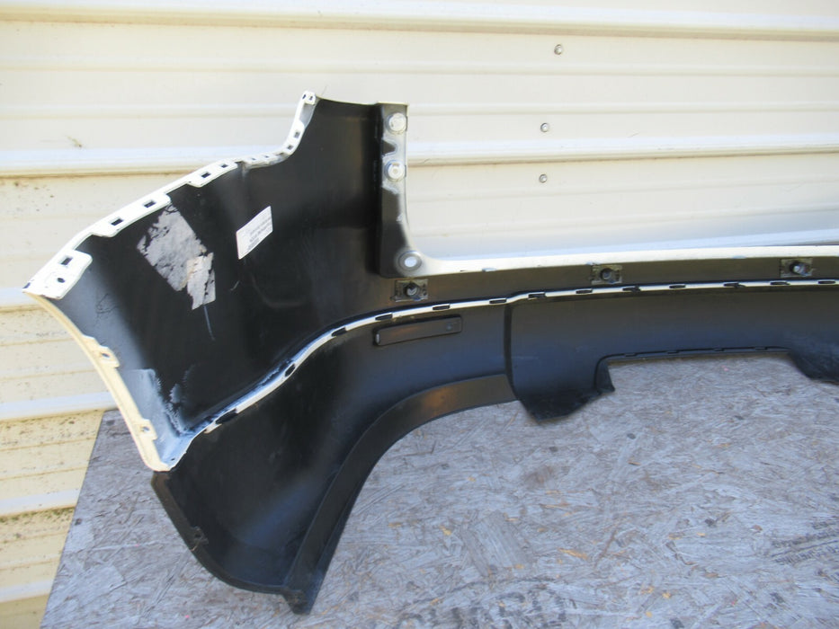 2007-2010 SATURN OUTLOOK REAR BUMPER COVER PANEL PLASTIC FACTORY 15922556 OEM
