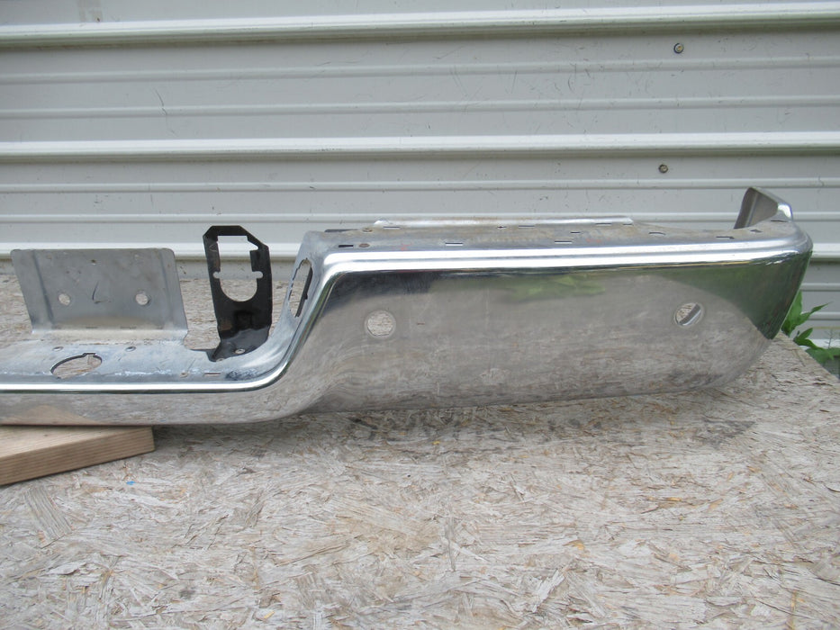 2009-2018 DODGE RAM 2500 3500 REAR BUMPER  PANEL CHROME W/SENSOR HOLES OEM